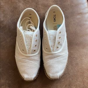 Toms gold shimmer slip-ons